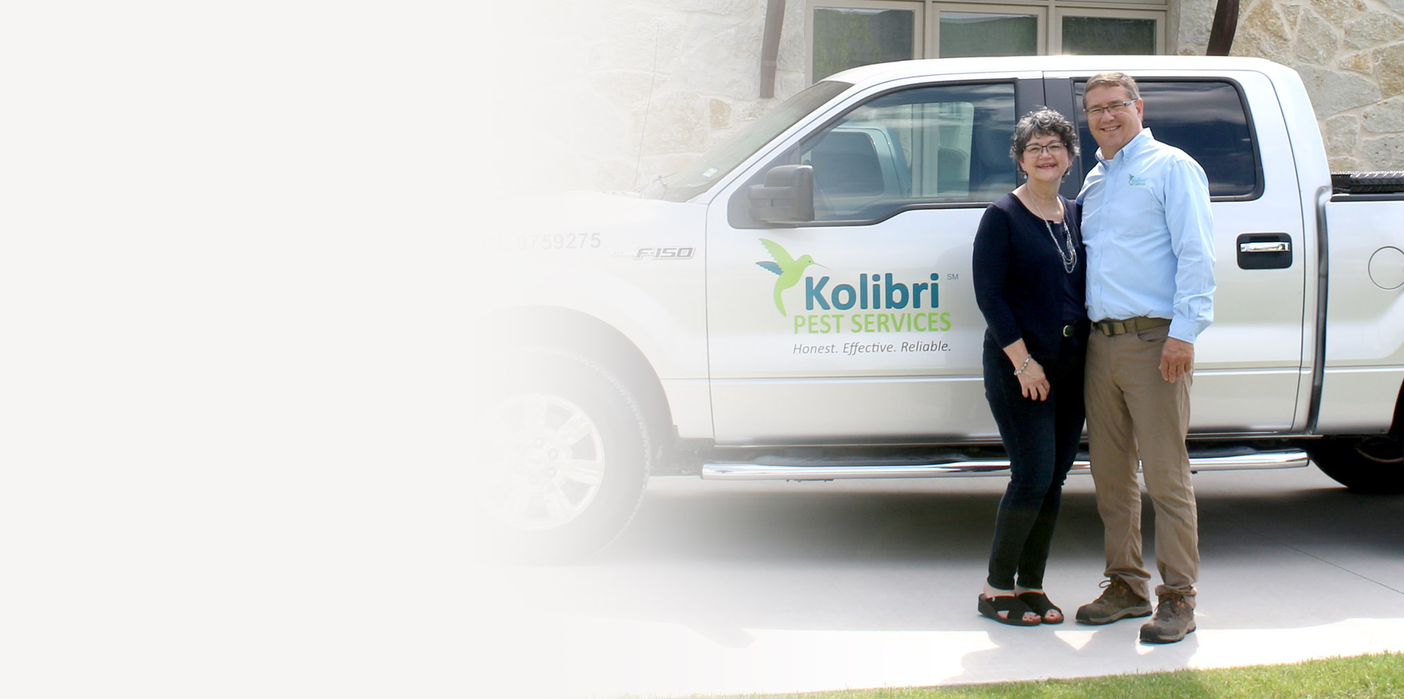 Tom and Bonnie Wright with Kolibri Pest Services truck